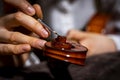Young Chinese violin maker at work in her workshop Royalty Free Stock Photo