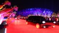 Young Chinese welcome APEC leaders upon their arrival at China National Swimming Center Royalty Free Stock Photo