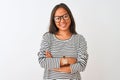 Young chinese woman wearing striped t-shirt and glasses over isolated white background happy face smiling with crossed arms Royalty Free Stock Photo