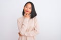 Young chinese woman wearing turtleneck sweater standing over isolated white background looking confident at the camera smiling Royalty Free Stock Photo