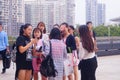 Young Chinese women play and take photos