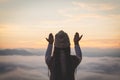 Young christian woman hands open palm up worship and praying to