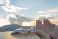 Young christian woman hands open palm up worship and praying to Royalty Free Stock Photo