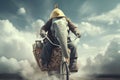 Young circus Elephant riding a bike in the clouds Royalty Free Stock Photo