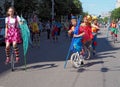 Young circus performers on cycles