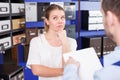 Young client woman choosing new mailbox and male worker helping Royalty Free Stock Photo