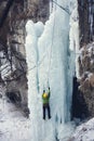 The climber climbs on ice. Royalty Free Stock Photo