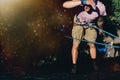 Young Climber Hanging On A Rock On A Rope And Looks Somewhere On The Wall. Extreme Lifestyle Outdoor Activity Concept Royalty Free Stock Photo