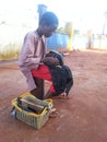 Young cobbler working