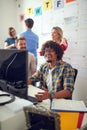 Young colleagues are in a good mood at work in the office. Employees, job, office Royalty Free Stock Photo