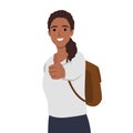 Young college student backpacking woman with thumbs up happy