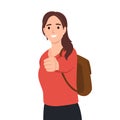 Young college student backpacking woman with thumbs up