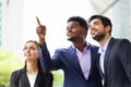 Young confident business people standing and looking forward to the future Royalty Free Stock Photo