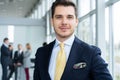 Young and confident businessman. Handsome young man in formalwear smiling at camera