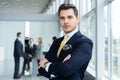 Young and confident businessman. Handsome young man in formalwear smiling at camera