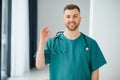 Young and confident male doctor portrait. Successful doctor career concept Royalty Free Stock Photo