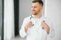Young and confident male doctor portrait. Successful doctor career concept Royalty Free Stock Photo