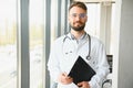 Young and confident male doctor portrait. Successful doctor career concept Royalty Free Stock Photo