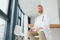 Young and confident male doctor portrait. Successful doctor career concept Royalty Free Stock Photo