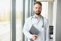 Young and confident male doctor portrait. Successful doctor career concept Royalty Free Stock Photo