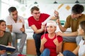 Young confident male safety instructor teach students to bandage the head Royalty Free Stock Photo