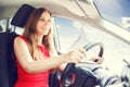 Young confident woman piloting jet aircraft car.