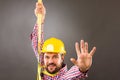 Young construction man withhard hat wearing a fall protection h Royalty Free Stock Photo