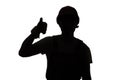 Young construction worker silhouette in hard hat showing thumbs up class sign on white isolated background Royalty Free Stock Photo