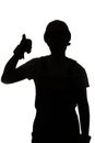 Young construction worker silhouette in hard hat showing thumbs up class sign on white isolated background Royalty Free Stock Photo