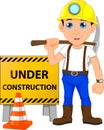 Young construction worker with under construction sign