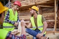 Young construction workers man and woman talking.Teamwork.Building. woodworking team work creatively Royalty Free Stock Photo