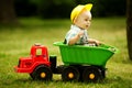 Young constructor sitting in the car