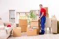 The young contractor with boxes working indoors Royalty Free Stock Photo