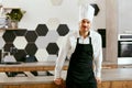 Young Cook In Kitchen. Portrait