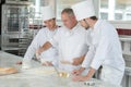 young cook students in training course Royalty Free Stock Photo