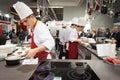 Young cooks work on their recipes at HOMI, home international show in Milan, Italy