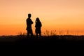 Young couple admiring sunset