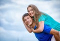 young couple against the sky