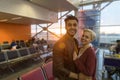 Young Couple In Airport Lounge Waiting Departure Happy Smile Hispanic Man And Woman Royalty Free Stock Photo