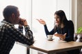 Young couple arguing in a cafe. Relationship problems. Royalty Free Stock Photo