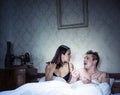 Young couple arguing and fighting in bed Royalty Free Stock Photo