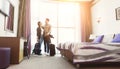 Young couple arrived to hotel room on honeymoon Royalty Free Stock Photo