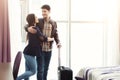 Young couple arrived to hotel room on vacation Royalty Free Stock Photo