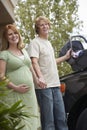 Young Couple With Baby Carrier