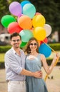 Young couple with balloons Royalty Free Stock Photo