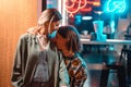 Young couple at the bar, guy hugs his girlfriend Royalty Free Stock Photo