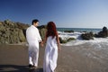 Young Couple at the beach walking Royalty Free Stock Photo