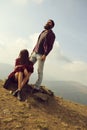 Young couple observe mountain scene Royalty Free Stock Photo