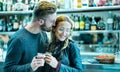 Young couple at beginning of love story in cocktail bar - Handsome man drinking coffee with nice woman - Relationship concept with