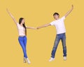 Young couple being happy and dancing